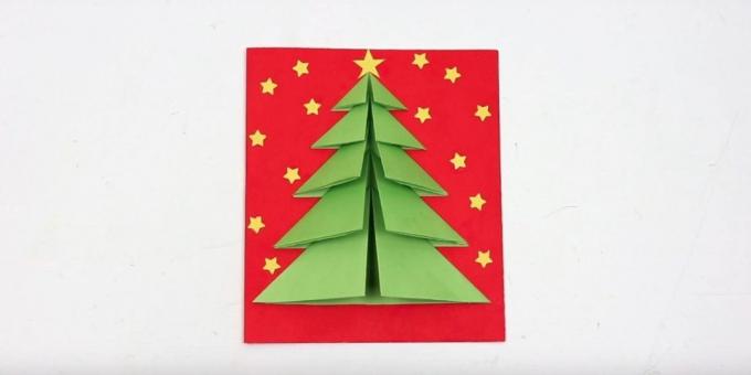 Božični kartice z božično drevo na naslovnici prostornine